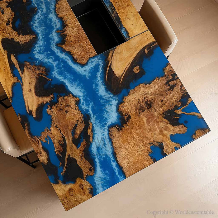 Modern luxury dining room featuring a blue epoxy waterfall table