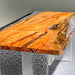 Golden Camphor Ice epoxy resin dining table styled in a modern dining room setup.