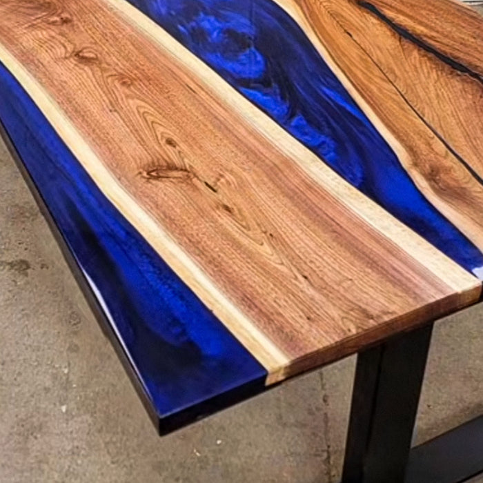 Luxury handcrafted walnut epoxy table with blue river effect