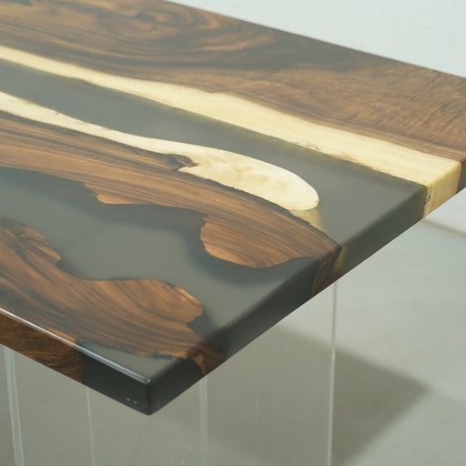 Luxury live edge walnut table with black epoxy resin.