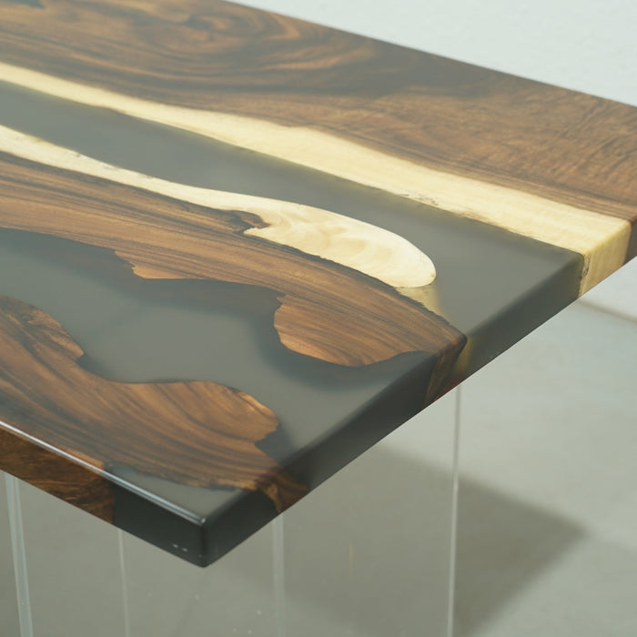 Luxury live edge walnut table with black epoxy resin.