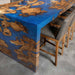 Luxury burl wood epoxy waterfall table in a contemporary interior