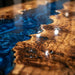 Handcrafted executive desk made of live edge poplar wood and blue resin.