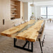 Top view of luxury gray epoxy dining table with natural wood edges