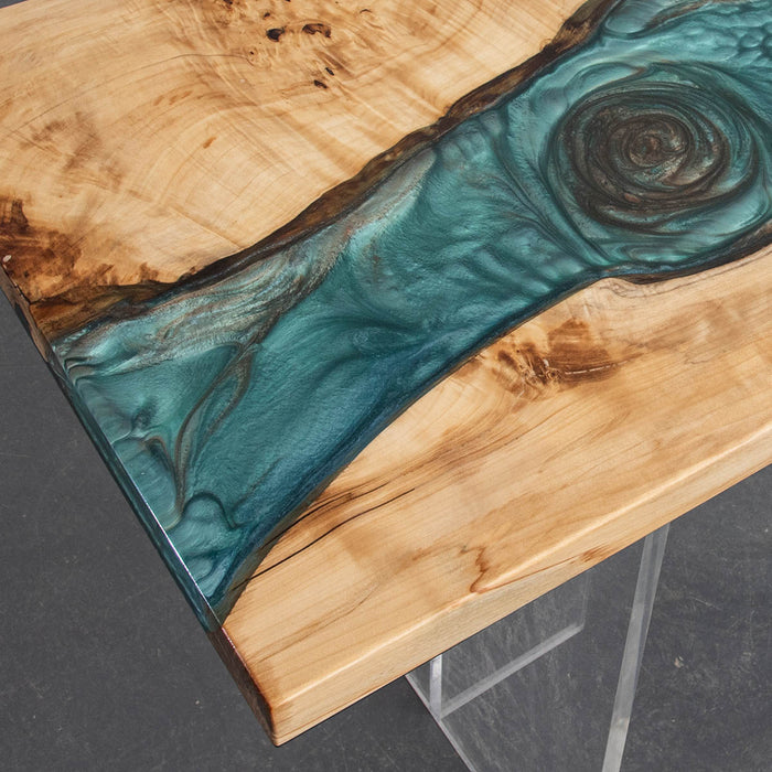 Luxury green epoxy and poplar wood table in elegant dining setting