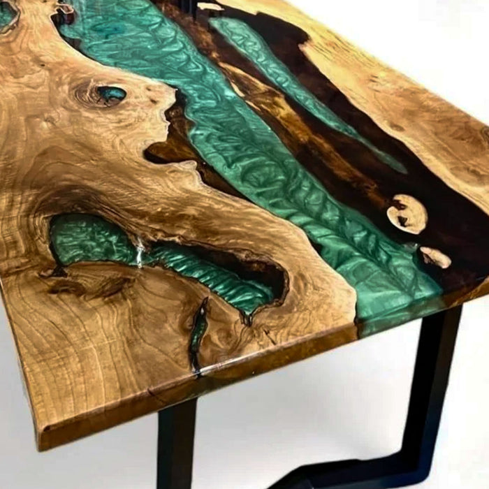Wooden table with green resin inlay on a white background