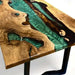 Wooden table with green resin inlay on a white background