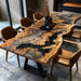 Custom epoxy river table blending natural wood with a mesmerizing black resin inlay, designed to resemble a starry night sky, enhancing luxury dining or office environments.