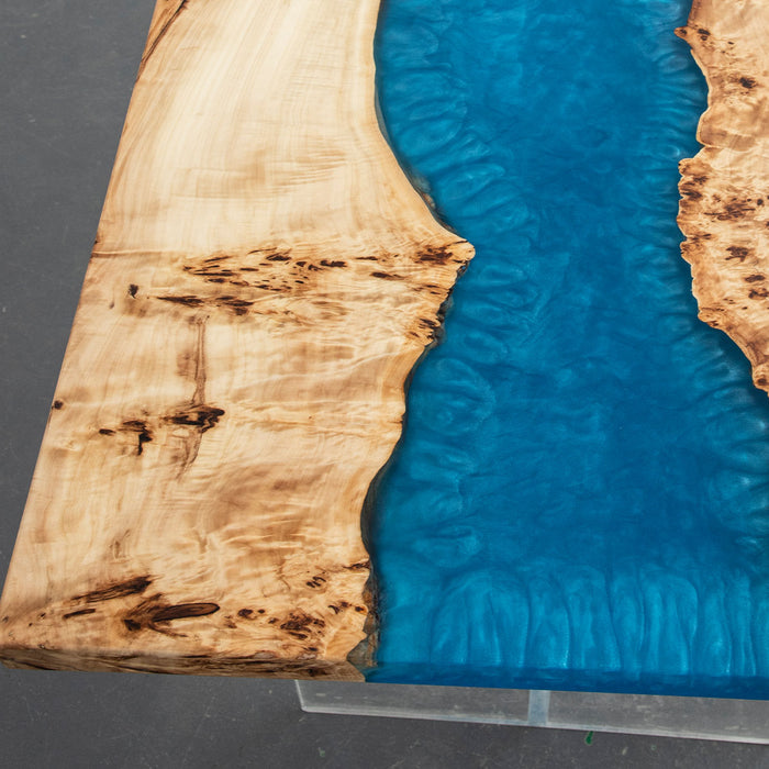 Luxury modern dining table made of poplar wood and blue epoxy river