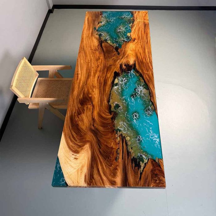 Wooden table with a blue resin inlay in a minimalistic room.