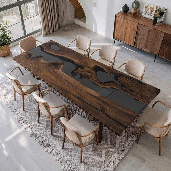 Custom olive wood and black epoxy dining table for luxury interiors