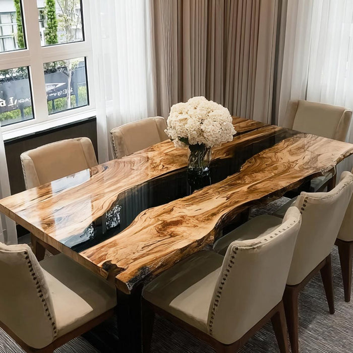 Luxury olive wood dining table with resin detail featured in a contemporary home interior.