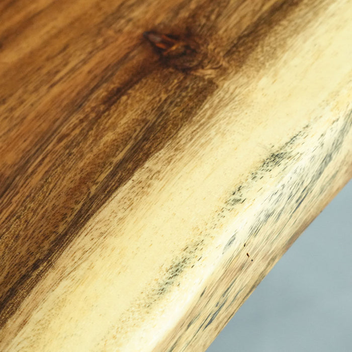 Close-up of a wooden surface with visible grain and texture