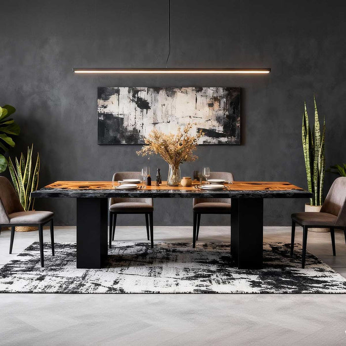 Modern dining room with a dark gray wall, abstract painting, and a marble table.