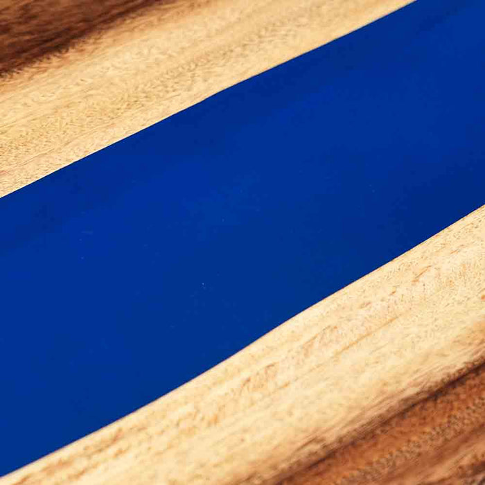 Close-up of a blue strip on a wooden surface