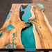 Luxury walnut burl epoxy table in modern living space