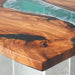 Luxury walnut epoxy dinning table in a contemporary interior setting