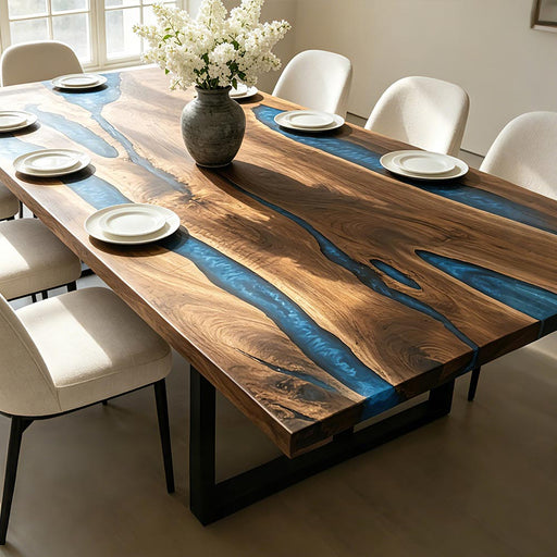 Luxury walnut dining table with a striking blue resin river centerpiece and premium craftsmanship.
