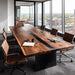 Long wooden conference table with chairs in a modern office setting