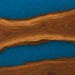 Wooden surface with blue resin inlay