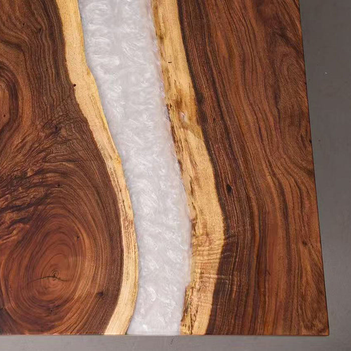 Wooden surface with a visible grain pattern on a gray background