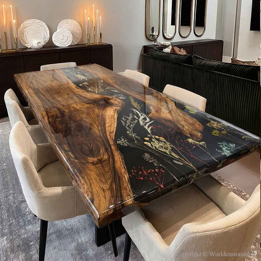 Modern farmhouse dining space featuring a handcrafted wood and resin table with natural floral design details
