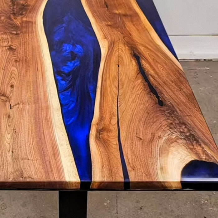 Midnight blue epoxy river dining table made from solid walnut wood