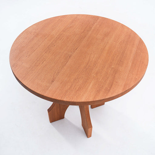 Minimalist end table made of Terminalia wood with curved leg structure