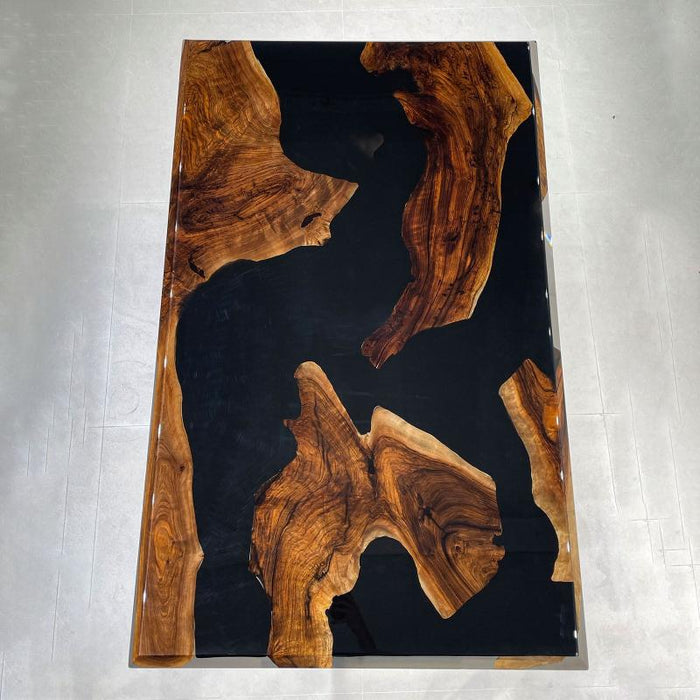 Modern black epoxy dining table for a contemporary dining room