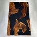 Modern black epoxy dining table for a contemporary dining room