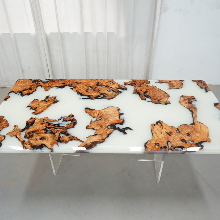 Modern burl wood epoxy dining table for contemporary home interiors