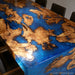 Modern epoxy waterfall table made from burl wood and blue resin