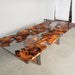modern epoxy dinning table featuring clear resin and burl wood