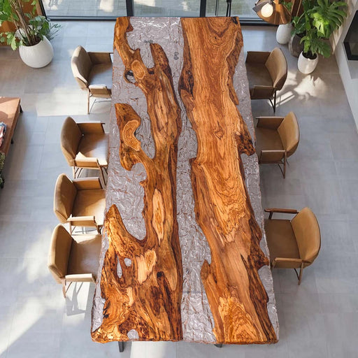 Modern olive wood table with clear epoxy ice effect in contemporary space