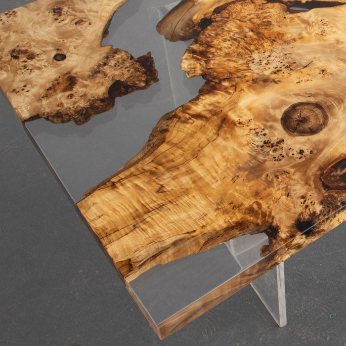 Natural wood epoxy river table in modern dining room