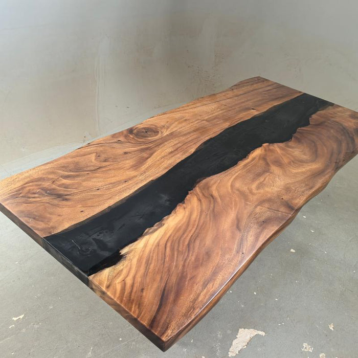 Modern epoxy dining table crafted from natural walnut wood