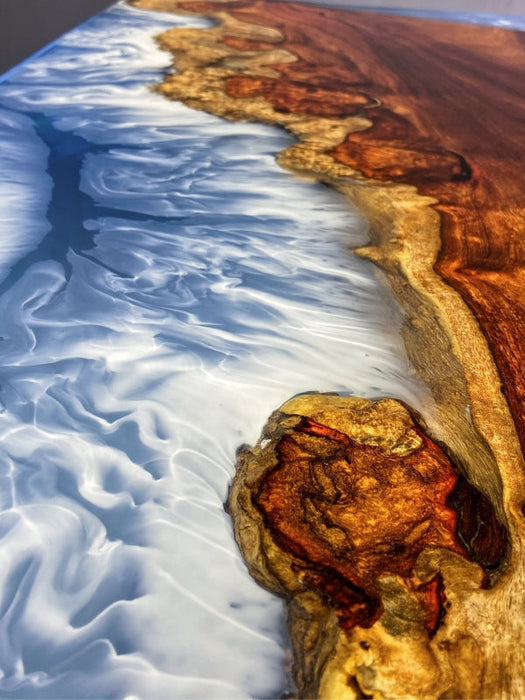 Modern epoxy resin meeting table with ocean-inspired blue river and natural camphor wood slab.