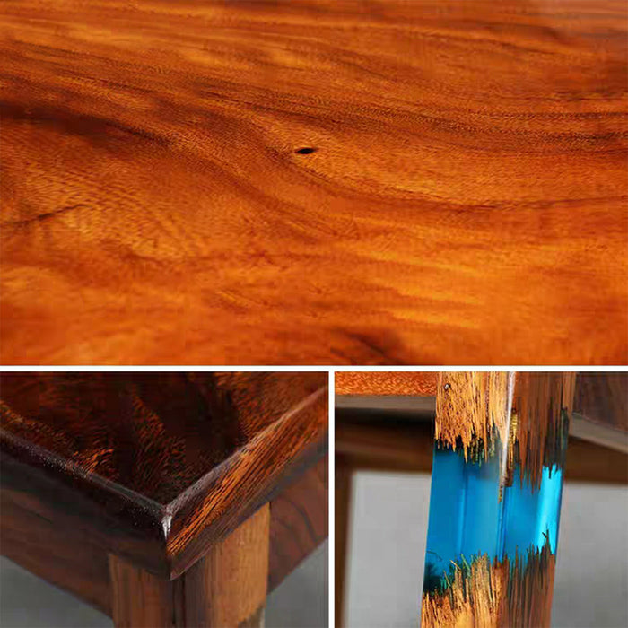 Close-up of wooden surface with a blue and gold interior, possibly a table or sculpture.