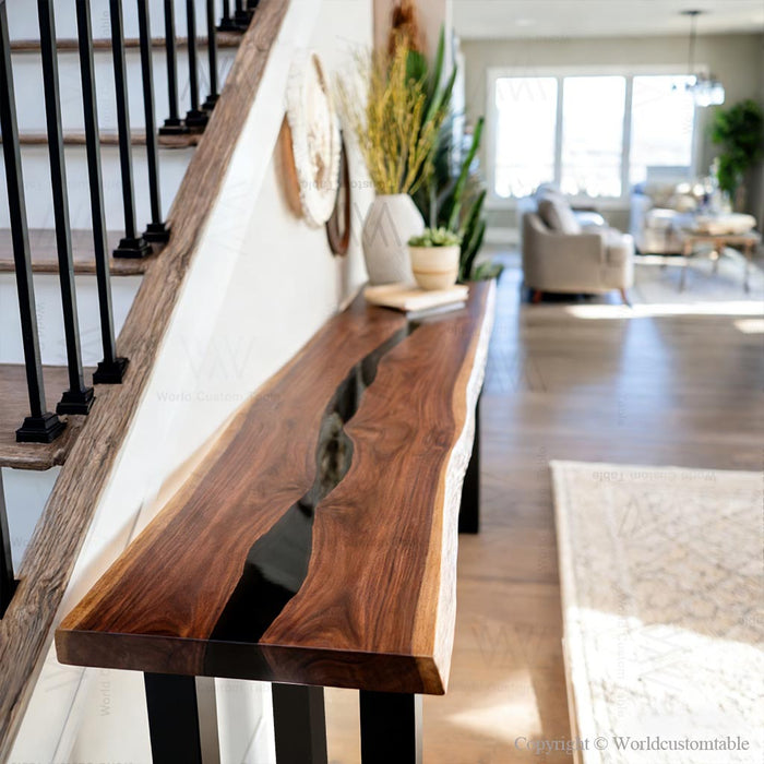 Modern epoxy river console table in entryway with elegant lighting