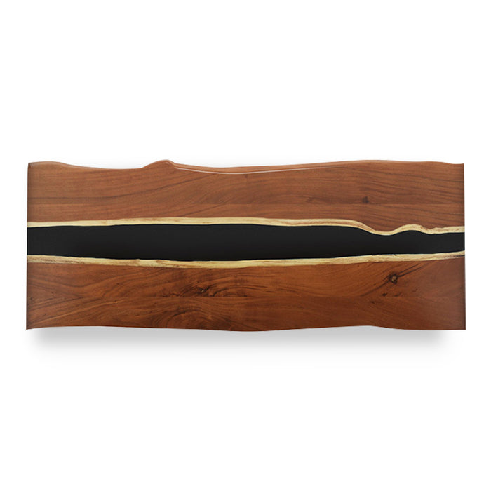 Wooden serving board with black center and gold accents on a white background