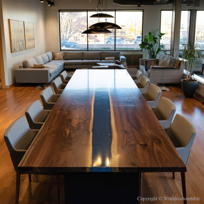 Modern executive conference table made with black walnut and navy blue epoxy