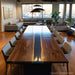Modern executive conference table made with black walnut and navy blue epoxy