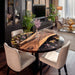 Modern farmhouse dining room featuring round epoxy dining table under natural light