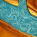 Modern farmhouse style walnut table with artistic resin inlay