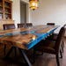 Blue epoxy dining table with black walnut wood in a modern American dining room