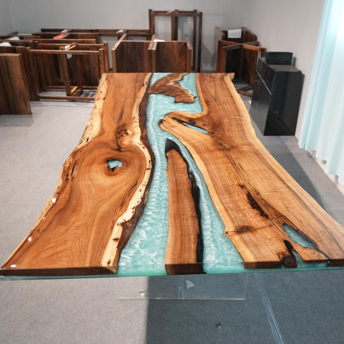 Black walnut teal epoxy dining table styled in a modern American dining room