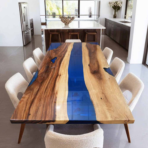 Dining table with blue resin inlay in a modern kitchen setting