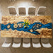 White poplar blue resin epoxy dining and conference table in modern interior space