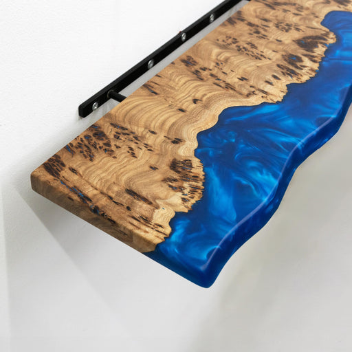Modern live edge wood wall shelf with blue epoxy accent for stylish home and office organization