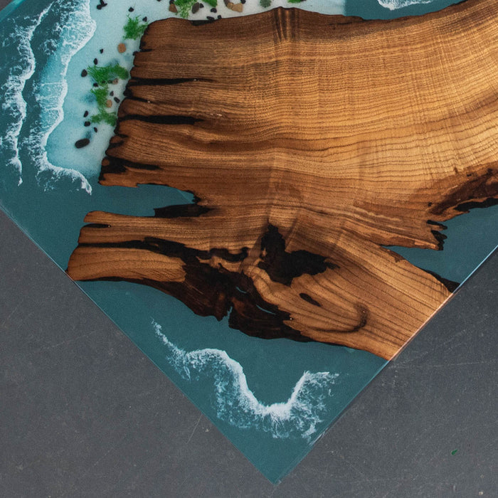 Modern epoxy and olive wood dining table with ocean design